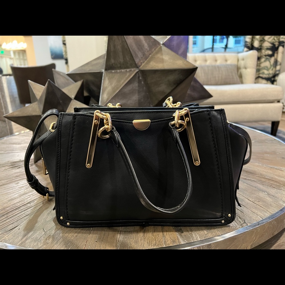 Coach Woman’s Black Bag.